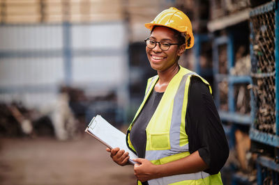 Female engineer confidently standing