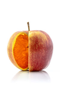 Close-up of apple against white background