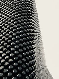 Close-up of modern building against clear sky