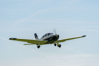 Lommis, switzerland, may 11, 2022 piper pa28-181 archer iii propeller plane is departing 