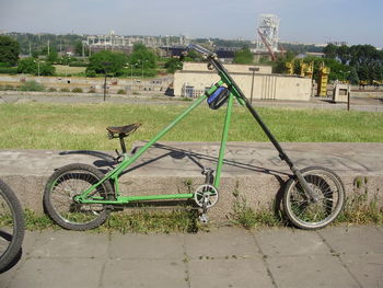 Bicycle parked on grass