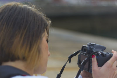Woman making photos with a camera