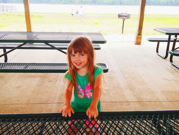 Portrait of happy girl in playground