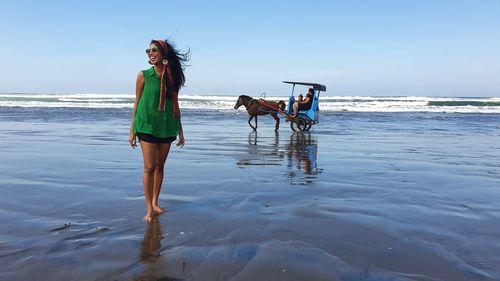 Full length of woman on beach