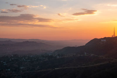 Scenic view of mountains against sky during sunset