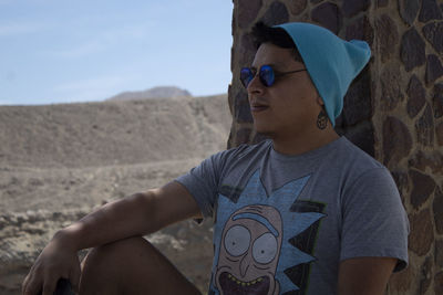 Rear view of boy wearing sunglasses