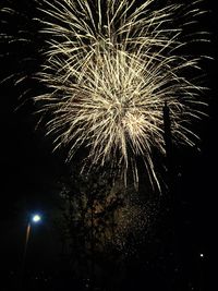 Low angle view of firework display