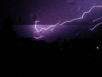 Lightning in sky at night