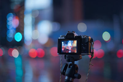 Close-up of camera at night