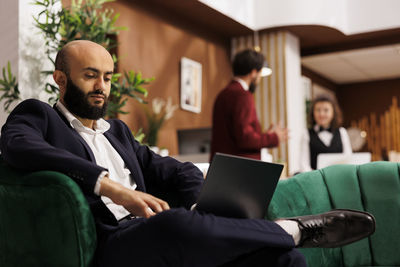 Low angle view of business colleagues working at office