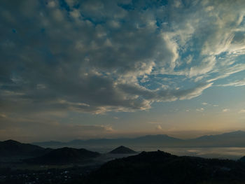 Scenic view of mountains against sky during sunset