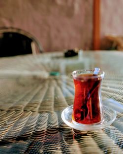 Close-up of tea in glass on table