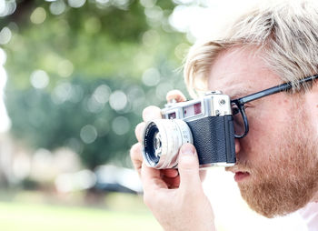 Portrait of man photographing