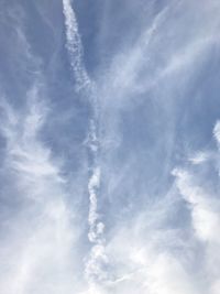 Low angle view of vapor trail in sky