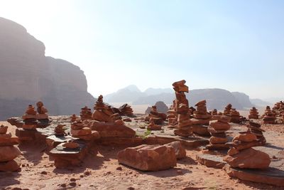 View of rock formations on mountain against clear sky