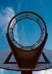 Basketball hoop and blue sky on the street