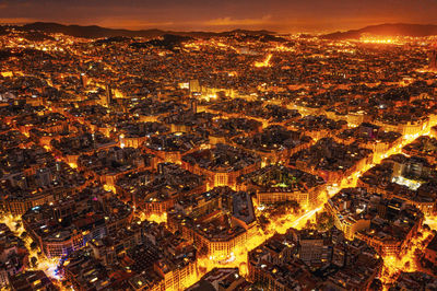 View of the residential areas of barcelona at night. city from a bird eye view