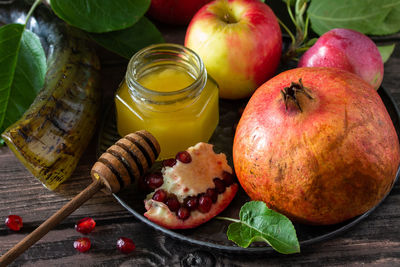 Close-up of fruits in jar on table