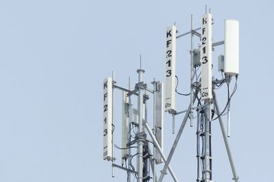 Low angle view of cables against clear sky