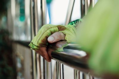 Close-up of hand holding train