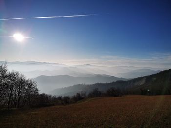 Scenic view of landscape against sky during sunset