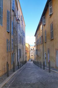 Narrow alley with buildings in background