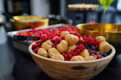 Close-up of strawberries in bowl on table