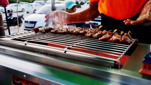 Close-up of meat on barbecue grill