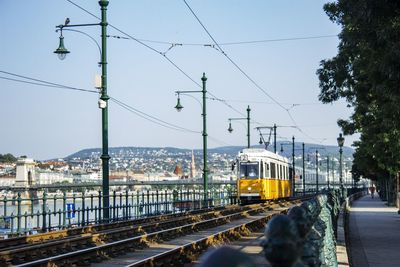 Train on railroad track against sky