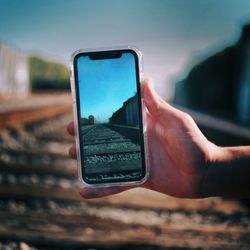 Close-up of hand holding smart phone