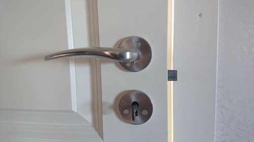 Close-up of door handle on wall