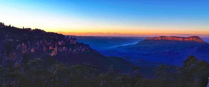 Scenic view of mountain against sky during sunset
