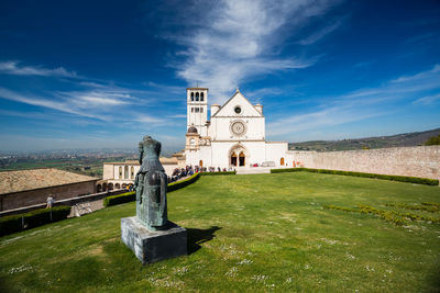 View of temple against building