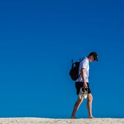 Young man at shell beach