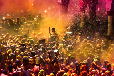 Crowd enjoying music concert at night