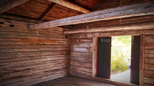 Low angle view of wooden door of building