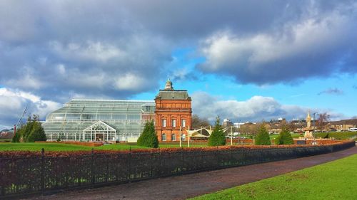 People palace at glasgow green against cloudy sky