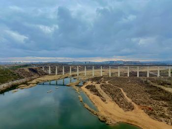 Bridge over land against sky