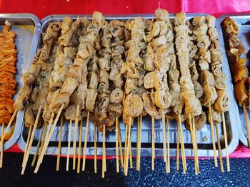 High angle view of meat on barbecue grill