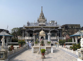 Statue in temple against clear sky