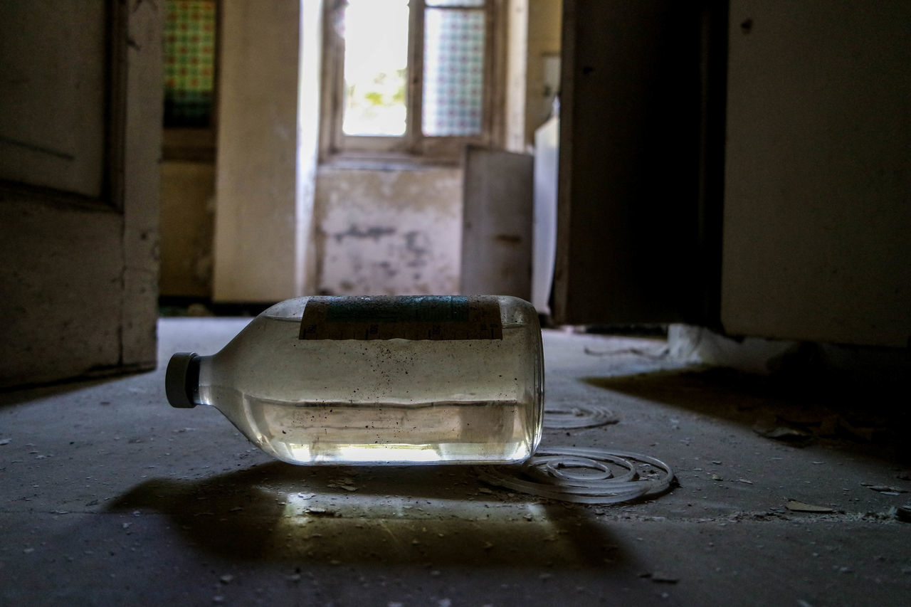 ABANDONED CHAIR IN ROOM