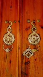 Directly above shot of carving on wooden door