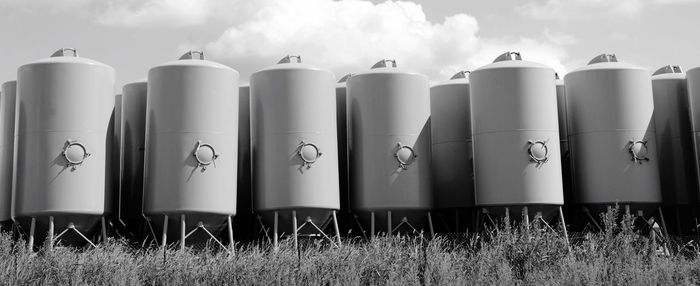 Silos against sky