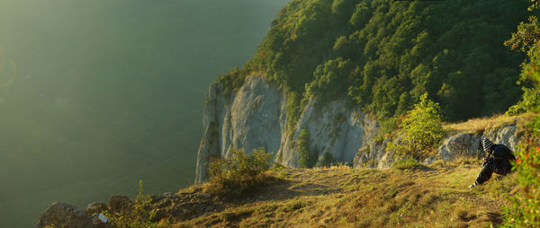 A landscape with foggy mountains silhouettes at morning sunrise. crimean peninsula, sidam qaya