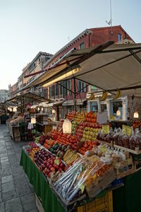 View of market stall against sky in city