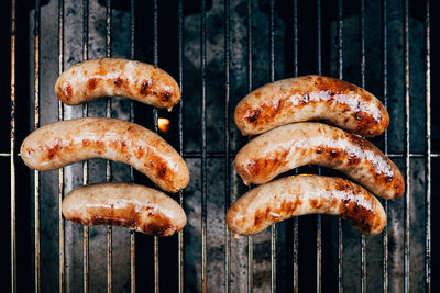 Close-up of sausages on barbecue grill