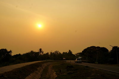 Scenic view of landscape at sunset