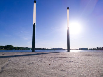 Scenic view of beach against clear blue sky