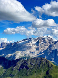 Scenic view of snowcapped mountains against sky, mt marmolada