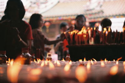 Group of people in front of chinese temple